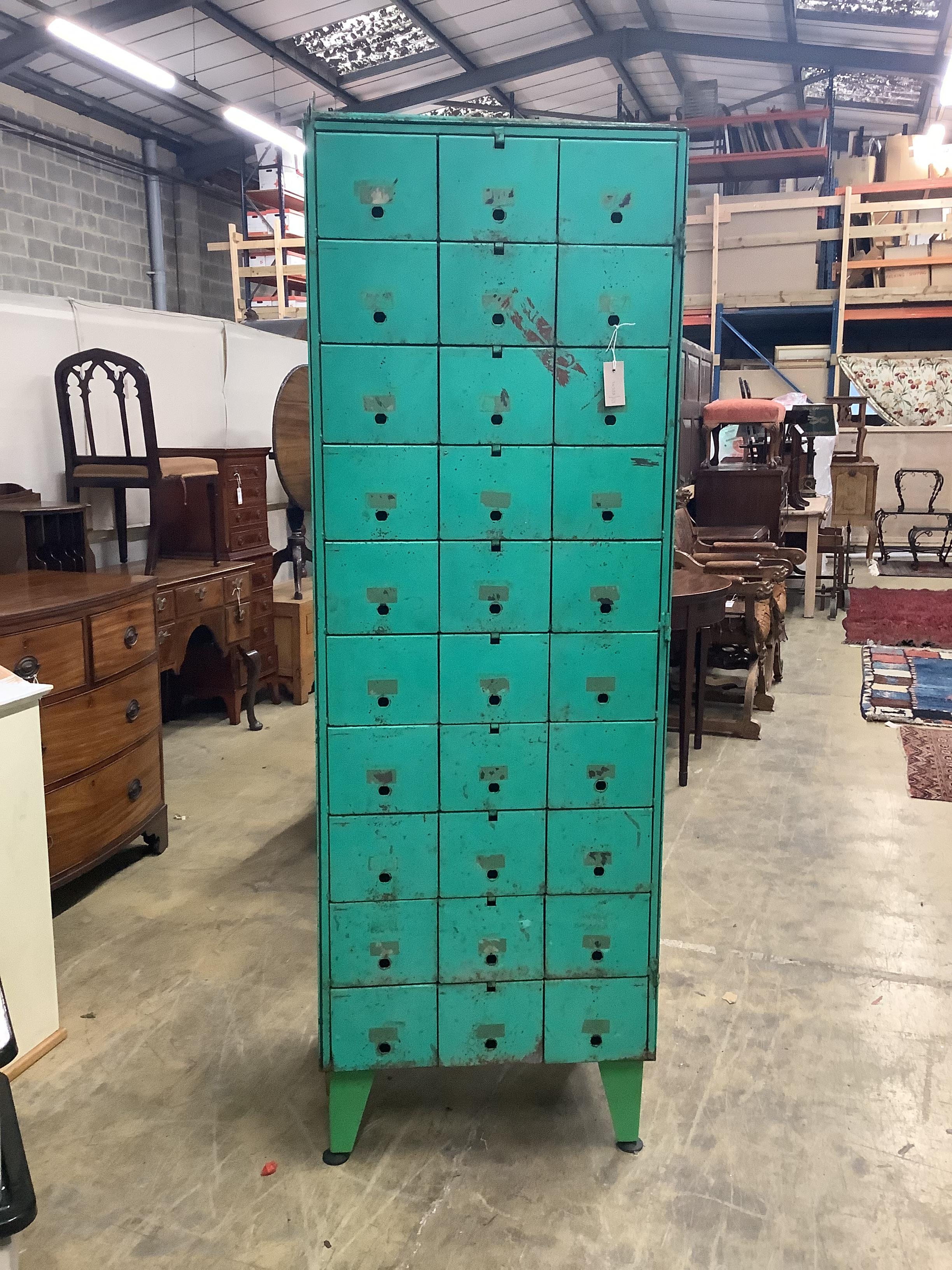 An industrial style painted metal locker, width 61cm, depth 51cm, height 182cm